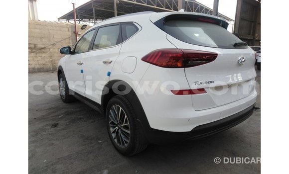 Sayi Imported Hyundai Tucson White Mota in Import - Dubai a Benin Sayi Imported Hyundai Tucson White Mota in Import - Dubai a Benin