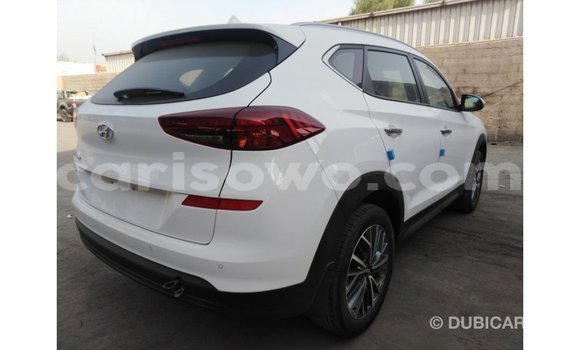 Sayi Imported Hyundai Tucson White Mota in Import - Dubai a Benin Sayi Imported Hyundai Tucson White Mota in Import - Dubai a Benin
