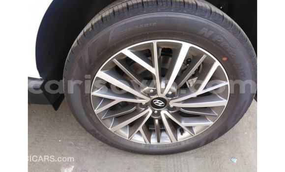 Sayi Imported Hyundai Tucson White Mota in Import - Dubai a Benin Sayi Imported Hyundai Tucson White Mota in Import - Dubai a Benin