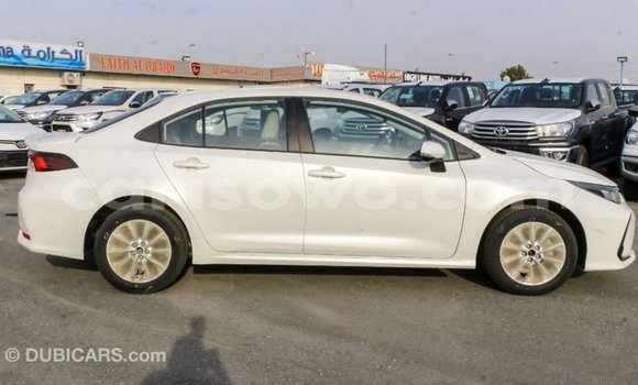Sayi Imported Toyota Corolla White Mota in Import - Dubai a Benin Sayi Imported Toyota Corolla White Mota in Import - Dubai a Benin