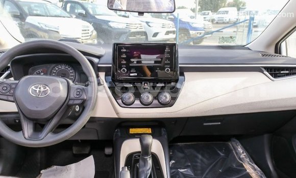 Sayi Imported Toyota Corolla White Mota in Import - Dubai a Benin Sayi Imported Toyota Corolla White Mota in Import - Dubai a Benin