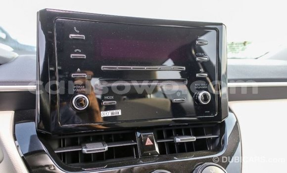 Sayi Imported Toyota Corolla White Mota in Import - Dubai a Benin Sayi Imported Toyota Corolla White Mota in Import - Dubai a Benin