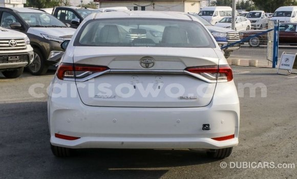 Sayi Imported Toyota Corolla White Mota in Import - Dubai a Benin Sayi Imported Toyota Corolla White Mota in Import - Dubai a Benin