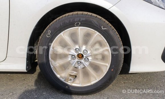 Sayi Imported Toyota Corolla White Mota in Import - Dubai a Benin Sayi Imported Toyota Corolla White Mota in Import - Dubai a Benin