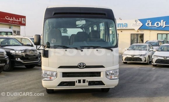 Sayi Imported Toyota Coaster White Babbar mota in Import - Dubai a Benin Sayi Imported Toyota Coaster White Babbar mota in Import - Dubai a Benin