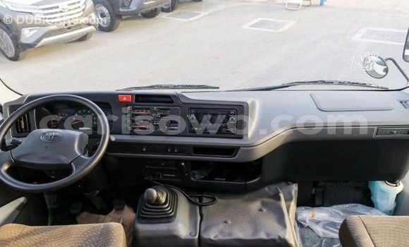 Sayi Imported Toyota Coaster White Babbar mota in Import - Dubai a Benin Sayi Imported Toyota Coaster White Babbar mota in Import - Dubai a Benin