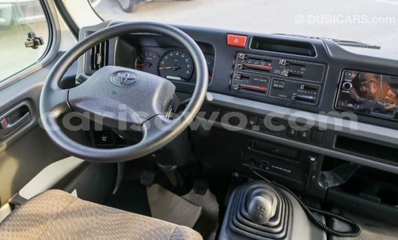 Sayi Imported Toyota Coaster White Babbar mota in Import - Dubai a Benin Sayi Imported Toyota Coaster White Babbar mota in Import - Dubai a Benin