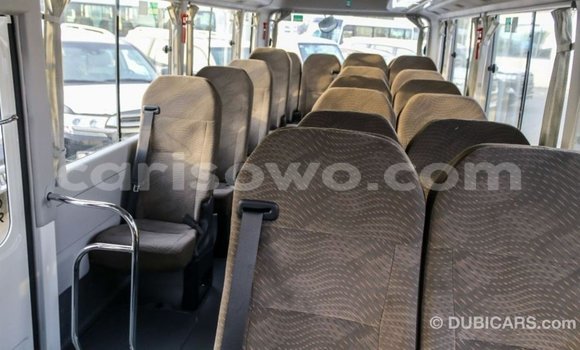 Sayi Imported Toyota Coaster White Babbar mota in Import - Dubai a Benin Sayi Imported Toyota Coaster White Babbar mota in Import - Dubai a Benin