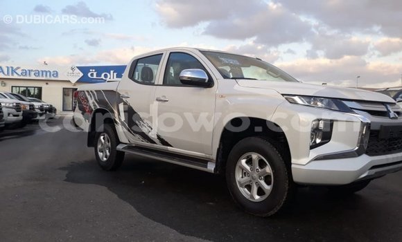 Buy Import Mitsubishi L200 White Car in Import - Dubai in Benign Buy Import Mitsubishi L200 White Car in Import - Dubai in Benign