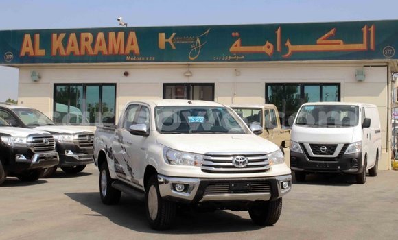 Sayi Imported Toyota Hilux White Mota in Import - Dubai a Benin Sayi Imported Toyota Hilux White Mota in Import - Dubai a Benin