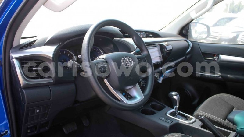 Big with watermark toyota hilux benign import dubai 7373