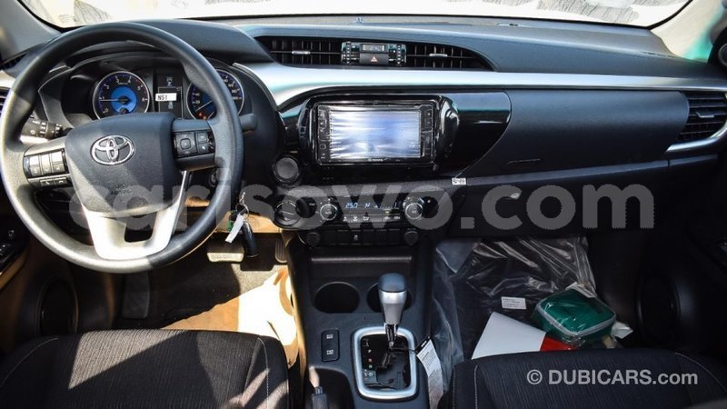 Big with watermark toyota hilux benign import dubai 7375