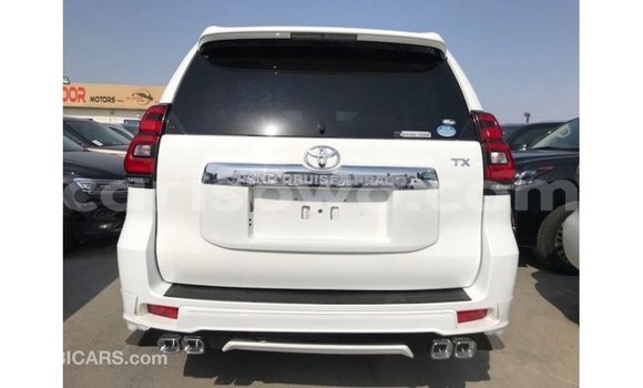 Acheter Import Voiture Toyota Prado Blanc à Import - Dubai, Benin Acheter Import Voiture Toyota Prado Blanc à Import - Dubai, Benin