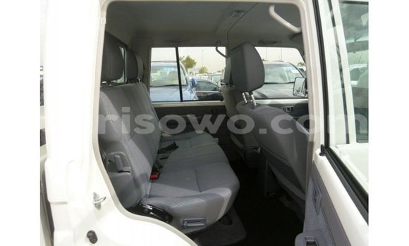 Sayi Imported Toyota Land Cruiser White Mota in Import - Dubai a Benin Sayi Imported Toyota Land Cruiser White Mota in Import - Dubai a Benin