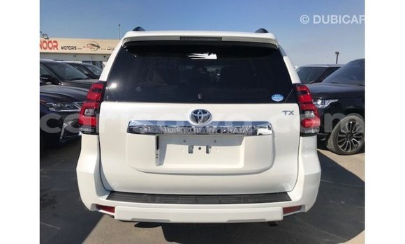 Sayi Imported Toyota Prado White Mota in Import - Dubai a Benin Sayi Imported Toyota Prado White Mota in Import - Dubai a Benin