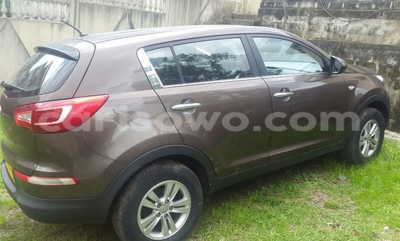 Sayi Na hannu Kia Sportage Brown Mota in Cotonou a Benin