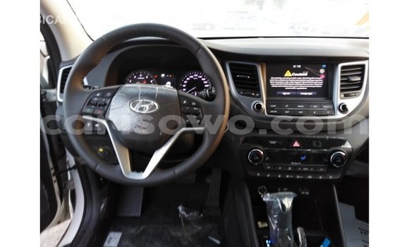 Sayi Imported Hyundai Tucson White Mota in Import - Dubai a Benin Sayi Imported Hyundai Tucson White Mota in Import - Dubai a Benin