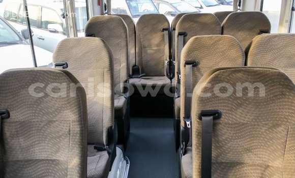 Sayi Imported Toyota Coaster White Babbar mota in Import - Dubai a Benin Sayi Imported Toyota Coaster White Babbar mota in Import - Dubai a Benin