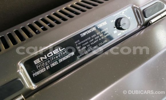 Sayi Imported Toyota Coaster White Babbar mota in Import - Dubai a Benin Sayi Imported Toyota Coaster White Babbar mota in Import - Dubai a Benin