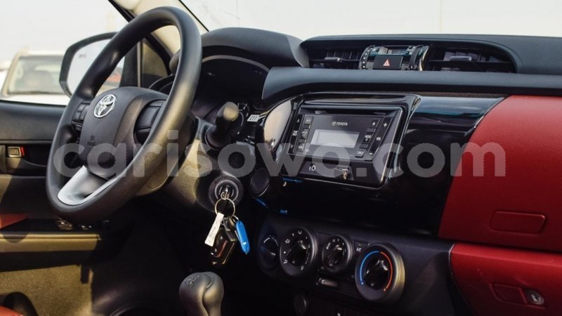 Big with watermark toyota hilux benign import dubai 7703