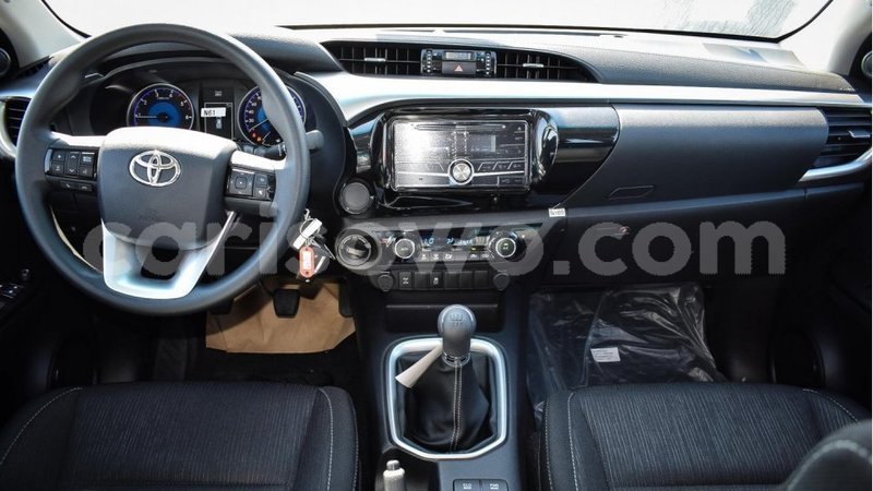 Big with watermark toyota hilux benign import dubai 7704