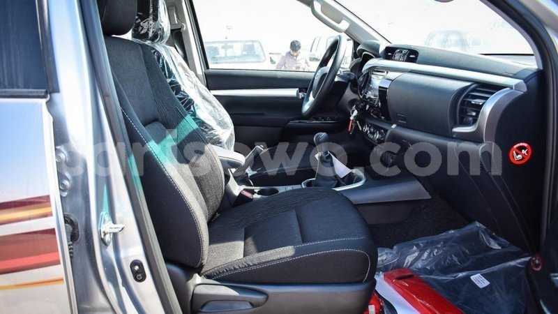 Big with watermark toyota hilux benign import dubai 7704