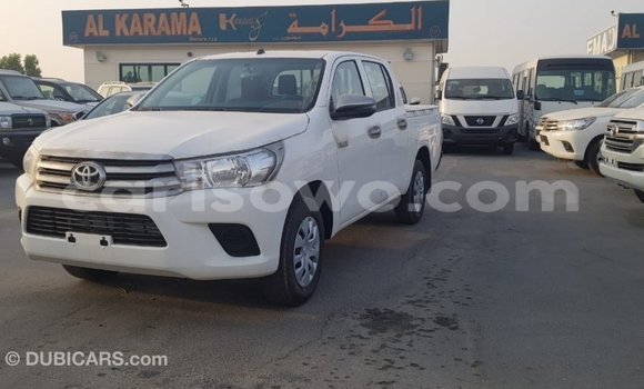 Sayi Imported Toyota Hilux White Mota in Import - Dubai a Benin Sayi Imported Toyota Hilux White Mota in Import - Dubai a Benin