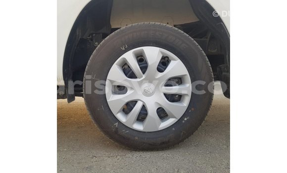 Sayi Imported Toyota Hilux White Mota in Import - Dubai a Benin Sayi Imported Toyota Hilux White Mota in Import - Dubai a Benin