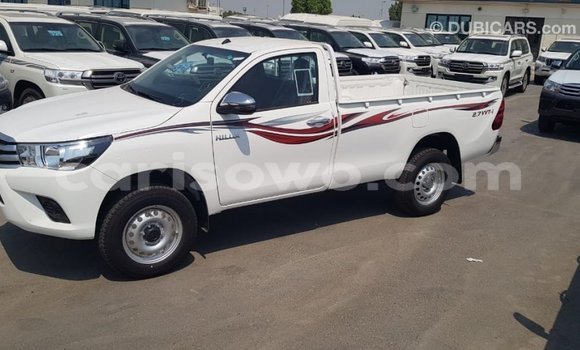 Sayi Imported Toyota Hilux White Mota in Import - Dubai a Benin Sayi Imported Toyota Hilux White Mota in Import - Dubai a Benin