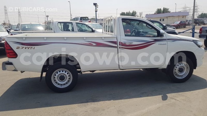 Big with watermark toyota hilux benign import dubai 7708