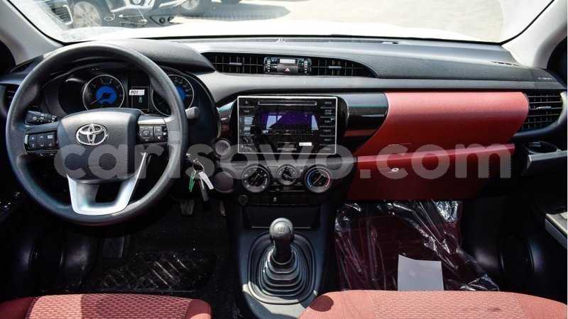 Big with watermark toyota hilux benign import dubai 7709