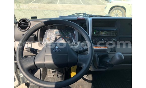 Sayi Imported Mitsubishi Carisma White Mota in Import - Dubai a Benin Sayi Imported Mitsubishi Carisma White Mota in Import - Dubai a Benin