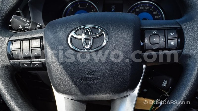 Big with watermark toyota hilux benign import dubai 7714