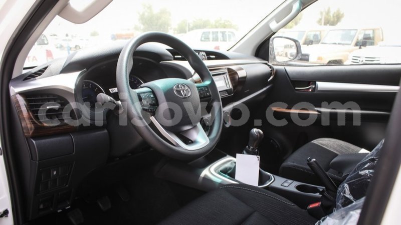 Big with watermark toyota hilux benign import dubai 7716