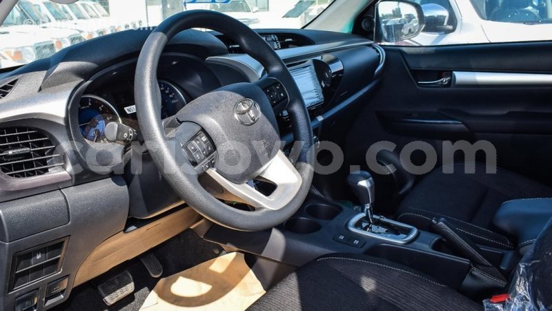 Big with watermark toyota hilux benign import dubai 7719