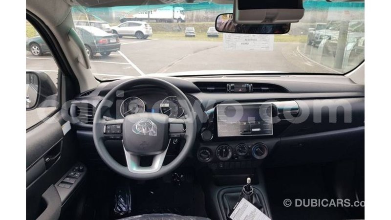 Big with watermark toyota hilux benin import dubai 7723