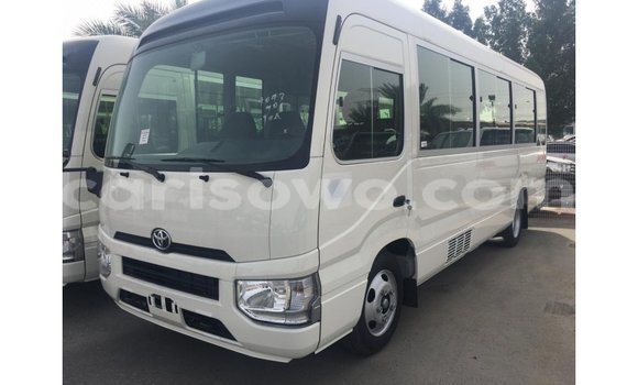 Sayi Imported Toyota Coaster White Babbar mota in Import - Dubai a Benin Sayi Imported Toyota Coaster White Babbar mota in Import - Dubai a Benin