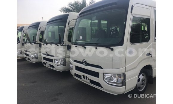 Sayi Imported Toyota Coaster White Babbar mota in Import - Dubai a Benin Sayi Imported Toyota Coaster White Babbar mota in Import - Dubai a Benin