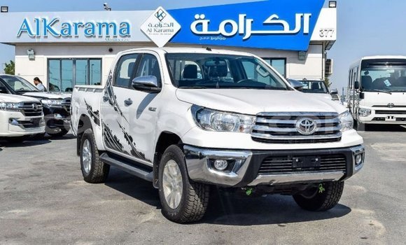 Sayi Imported Toyota Hilux White Mota in Import - Dubai a Benin Sayi Imported Toyota Hilux White Mota in Import - Dubai a Benin