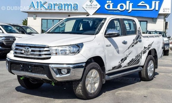 Sayi Imported Toyota Hilux White Mota in Import - Dubai a Benin Sayi Imported Toyota Hilux White Mota in Import - Dubai a Benin