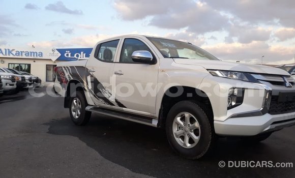 Sayi Imported Mitsubishi L200 White Mota in Import - Dubai a Benin Sayi Imported Mitsubishi L200 White Mota in Import - Dubai a Benin
