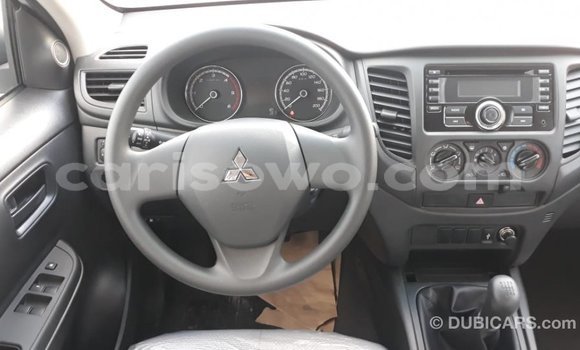 Sayi Imported Mitsubishi L200 White Mota in Import - Dubai a Benin Sayi Imported Mitsubishi L200 White Mota in Import - Dubai a Benin