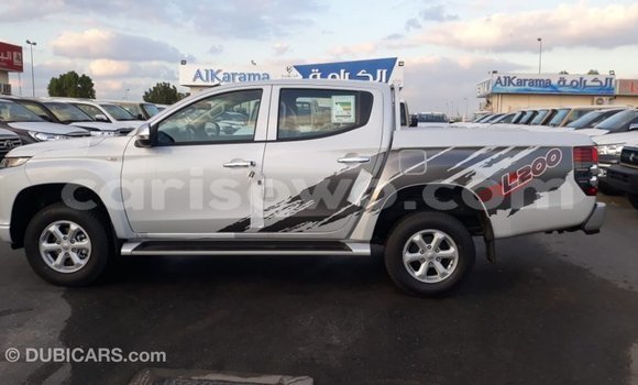 Sayi Imported Mitsubishi L200 White Mota in Import - Dubai a Benin Sayi Imported Mitsubishi L200 White Mota in Import - Dubai a Benin