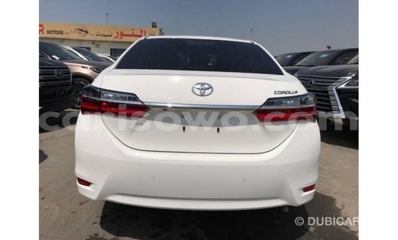 Sayi Imported Toyota Corolla White Mota in Import - Dubai a Benin Sayi Imported Toyota Corolla White Mota in Import - Dubai a Benin