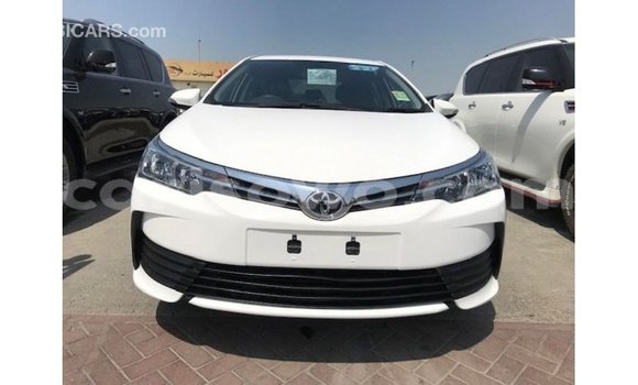 Sayi Imported Toyota Corolla White Mota in Import - Dubai a Benin Sayi Imported Toyota Corolla White Mota in Import - Dubai a Benin
