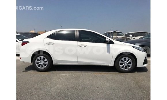 Sayi Imported Toyota Corolla White Mota in Import - Dubai a Benin Sayi Imported Toyota Corolla White Mota in Import - Dubai a Benin