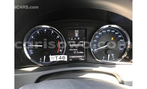 Sayi Imported Toyota Corolla White Mota in Import - Dubai a Benin Sayi Imported Toyota Corolla White Mota in Import - Dubai a Benin