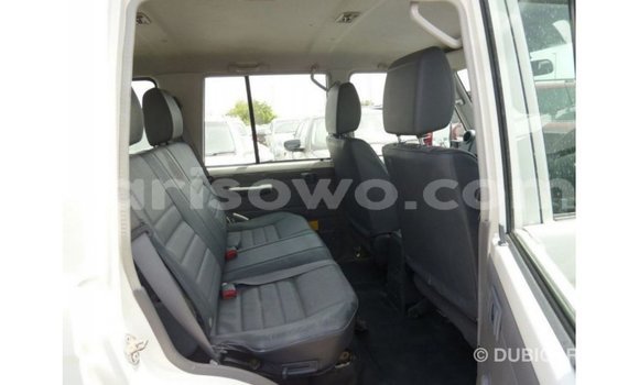 Sayi Imported Toyota Land Cruiser White Mota in Import - Dubai a Benin Sayi Imported Toyota Land Cruiser White Mota in Import - Dubai a Benin