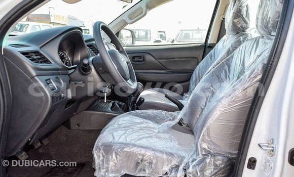 Sayi Imported Mitsubishi L200 White Mota in Import - Dubai a Benin Sayi Imported Mitsubishi L200 White Mota in Import - Dubai a Benin