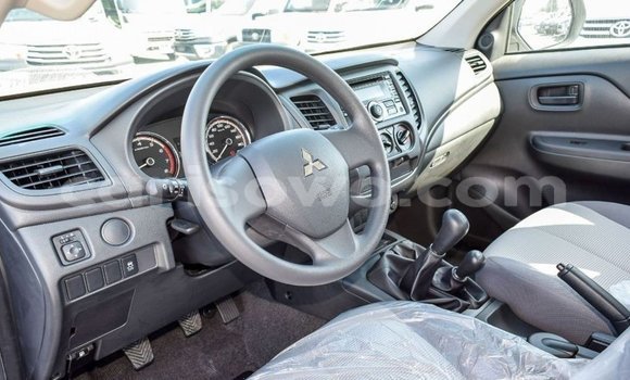 Sayi Imported Mitsubishi L200 White Mota in Import - Dubai a Benin Sayi Imported Mitsubishi L200 White Mota in Import - Dubai a Benin